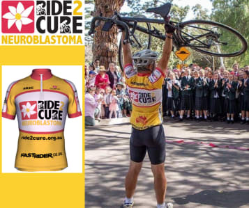 Ride2Cure Yellow Shirt and Steve Taylor holding bike above his head